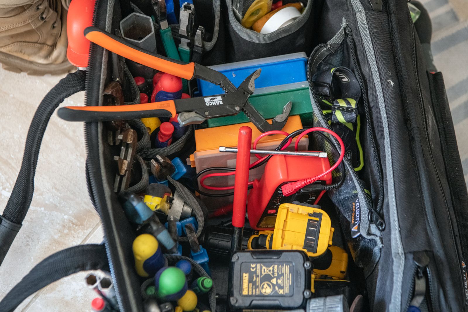 Professional plumbing equipment and tools - Rosebourne Plumbing tool bag with organized plumbing tools